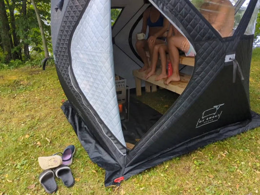 sandals and family togetherness in a sauna tent