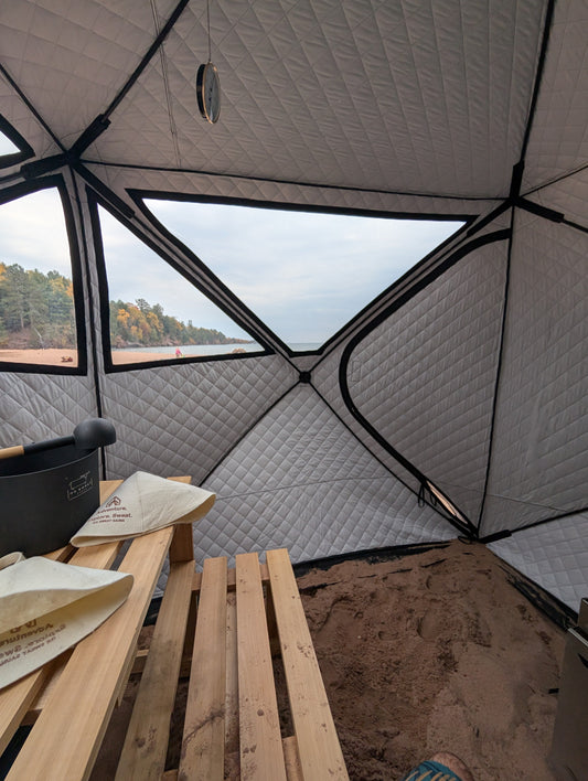 Sauna on a beach in the Fall with cold plunge out the window 